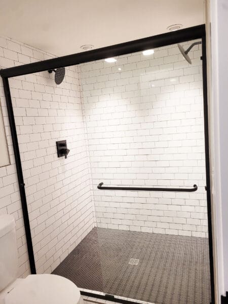 Bathroom Remodel with dual black shower heads