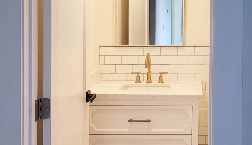 bath remodel with gold sink faucet 1536x1024